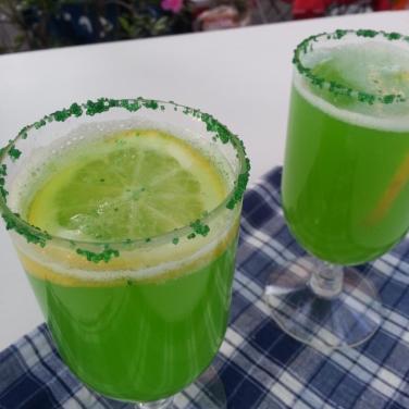 Trisha Yearwood's Green Punch with a few Some Kinda Good enhancements, like Vodka and a green sugar rim.